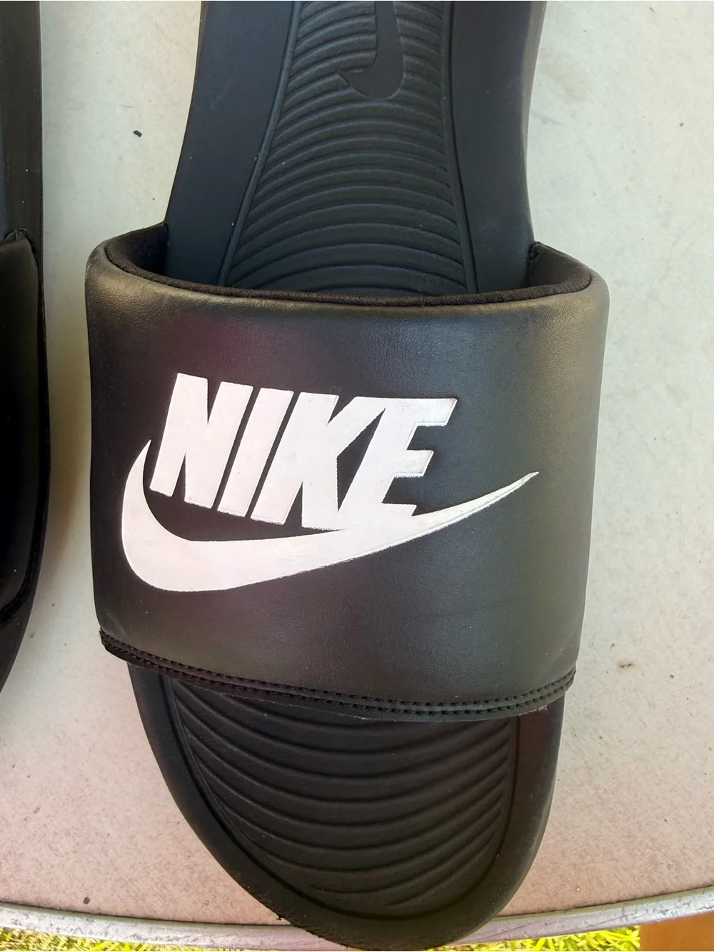 Men’s Nike Black Slides with White Logo